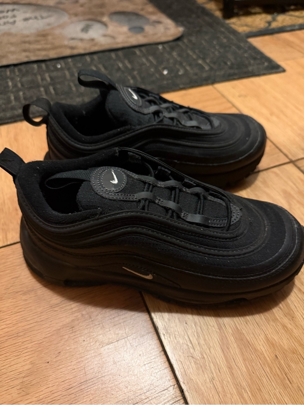 Nike Kids Black Sneakers with Reflective Silver Accents - Picture 2 of 3